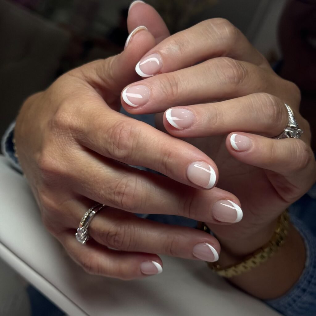 Micro French manicure on natural nails at Nailbox Co.