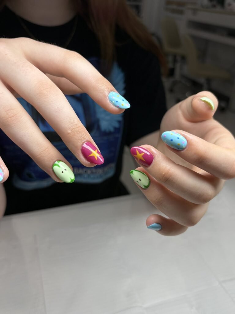 Mix-and-match nail art with stars and smiley faces at Nailbox Co.