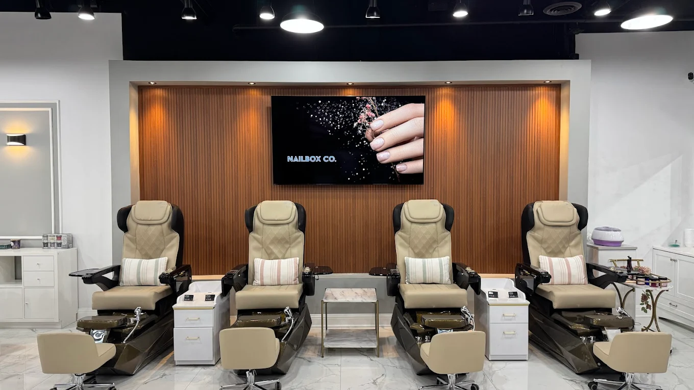 Pedicure chairs inside Nailbox Co. nail salon in Alpharetta, GA