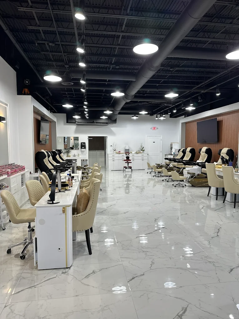 Nailbox Co. salon floor with manicure and pedicure stations